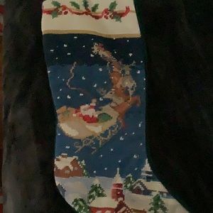 Exquisite Santa in his flying sleigh stocking